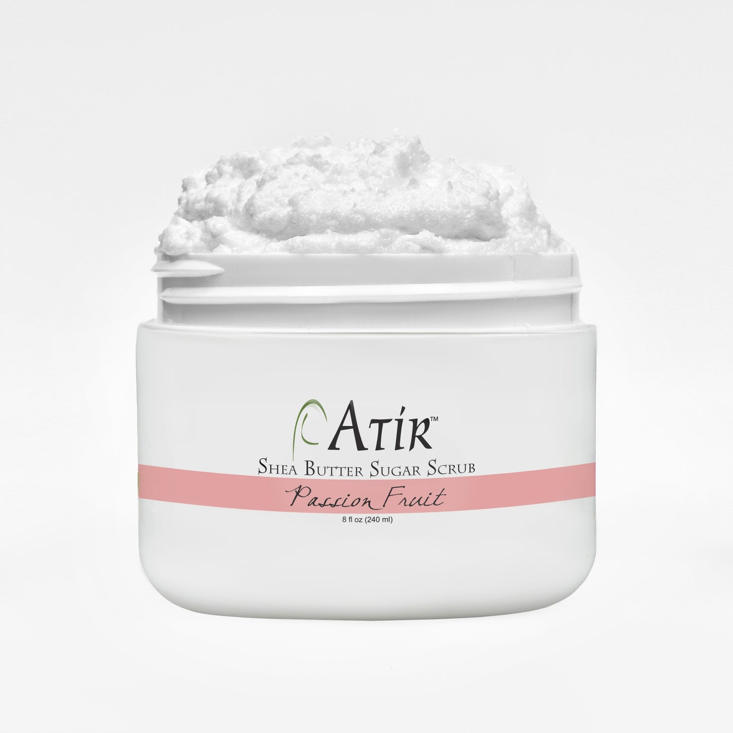Open jar of Passion Fruit ATi Shea Butter Sugar Scrub with whipped white scrub billowing to the top