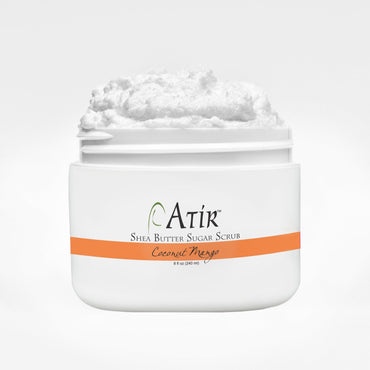Open jar of Coconut Mango ATiR Shea Butter Sugar Scrub with whipped white scrub billowing to the top