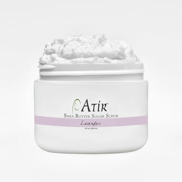 Open jar of Lavender ATiR Shea Butter Sugar Scrub with whipped white scrub billowing to the top