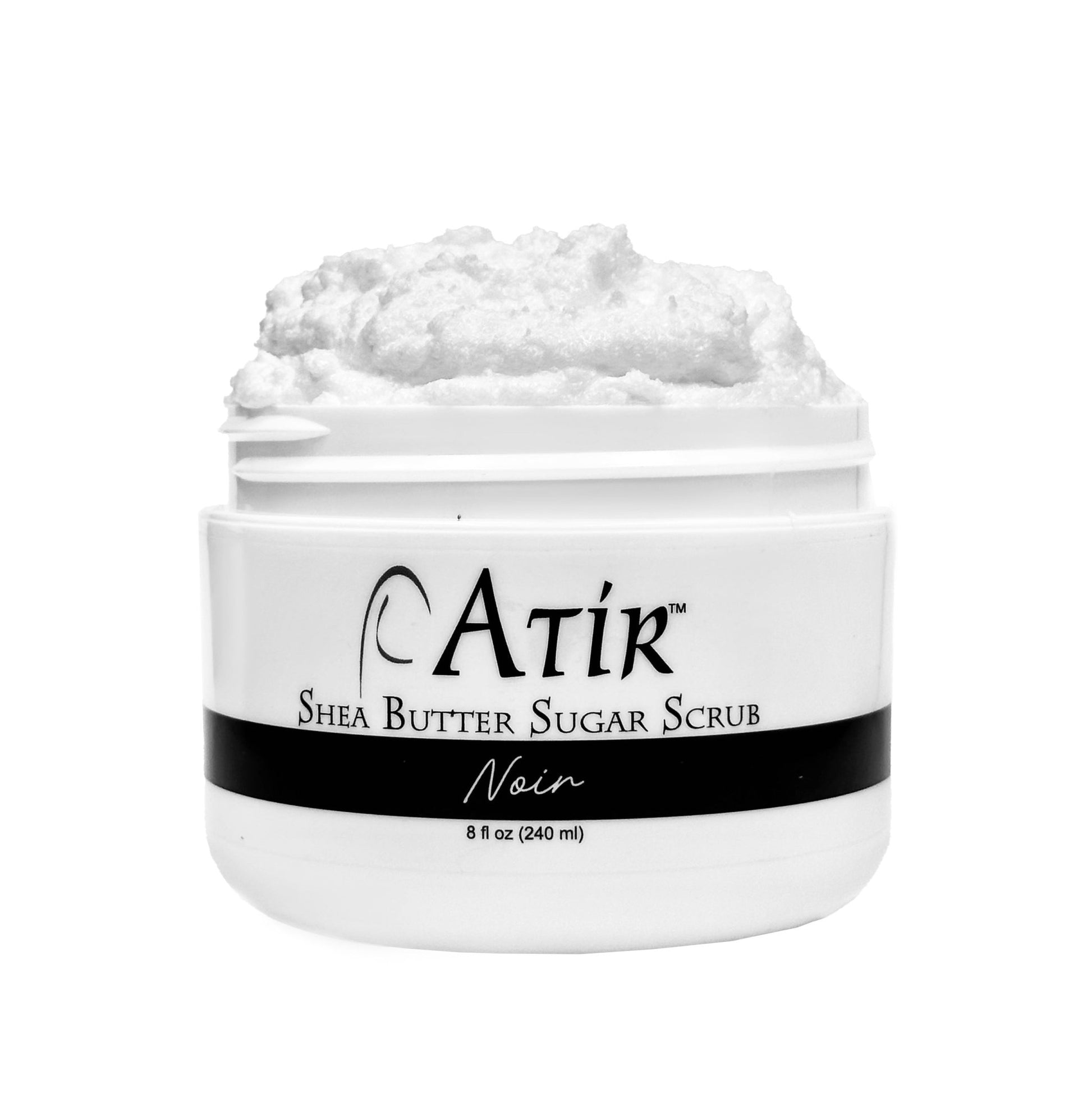 Open jar of Noir ATiR Shea Butter Sugar Scrub with whipped fluffy clouds of scrub billowing to the top