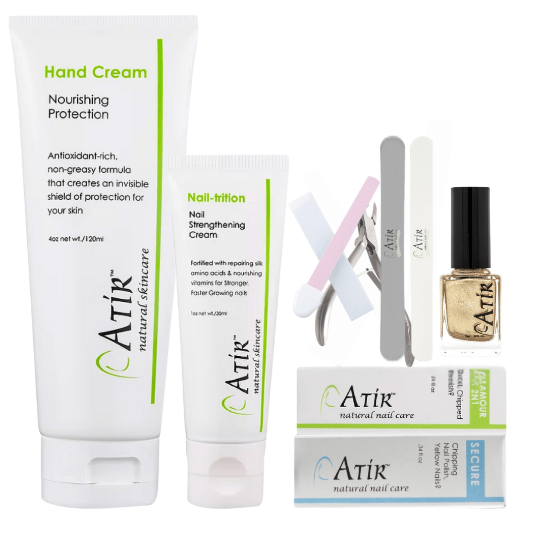 ATiR Deluxe Natural Nail Care Kit with non-toxic nail polish, base and top coats, Nail-Trition cuticle cream, hand cream, and professional nail tools for complete at-home manicure care.