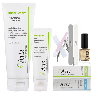 ATiR Deluxe Natural Nail Care Kit with non-toxic nail polish, base and top coats, Nail-Trition cuticle cream, hand cream, and professional nail tools for complete at-home manicure care.